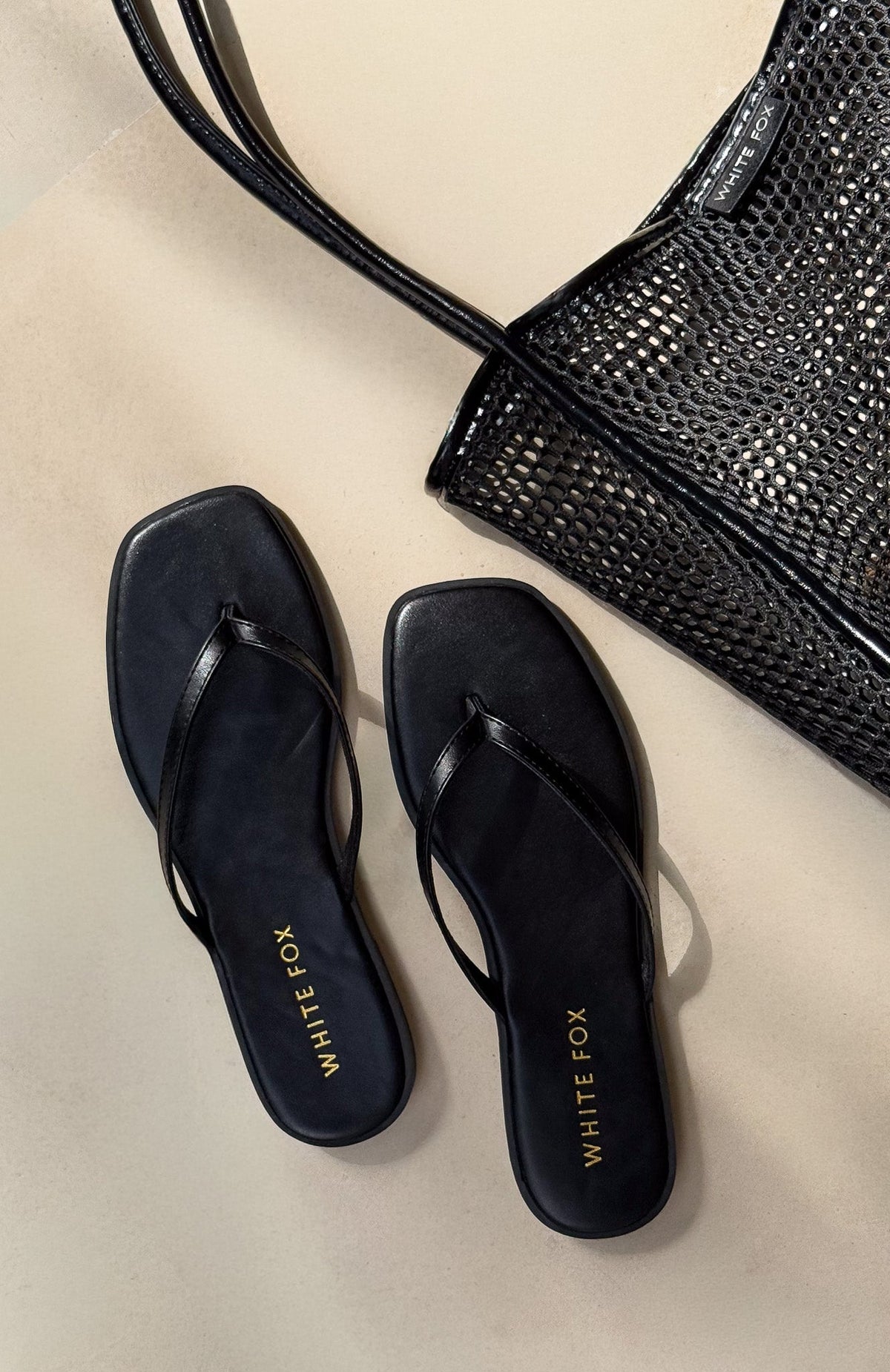 Trending Breccan Thong Sandals Black
